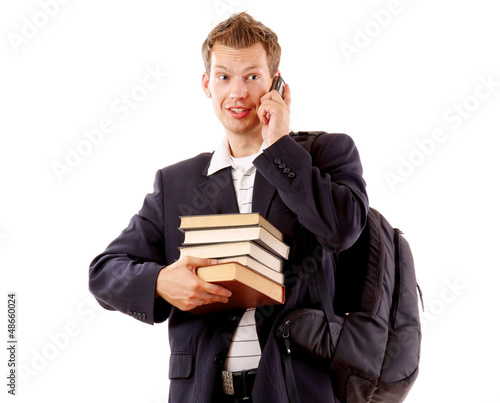 Happy student with pile of books