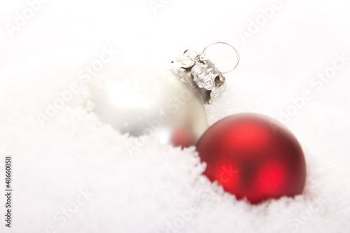 Christmas tree balls in snow