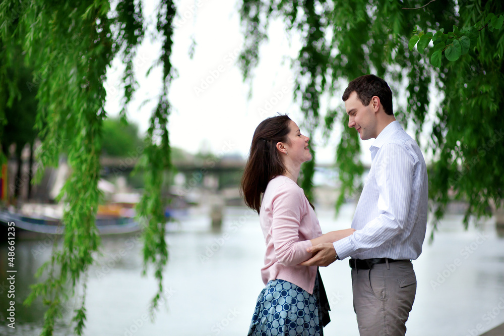Romantic dating couple in a Parisian park Romantic dating couple in a Parisian park