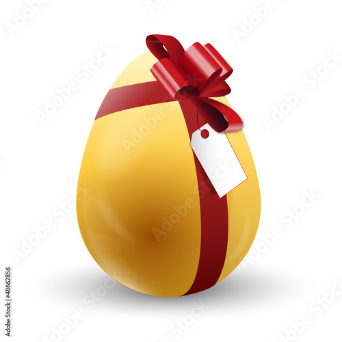 Golden Easter egg with ribbon