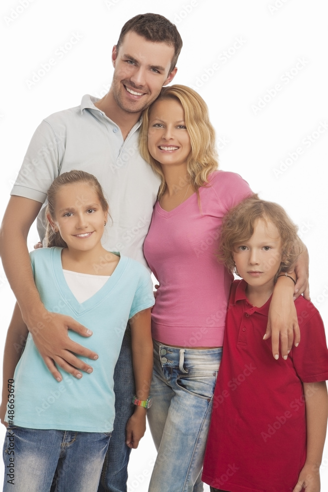 portrait of young happy caucasian family standing together with portrait of young happy caucasian family standing together with