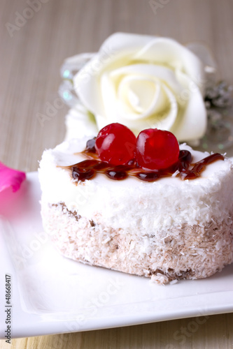 Celebratory cake with cherries