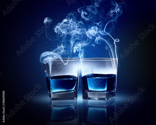 Two glasses of blue cocktail