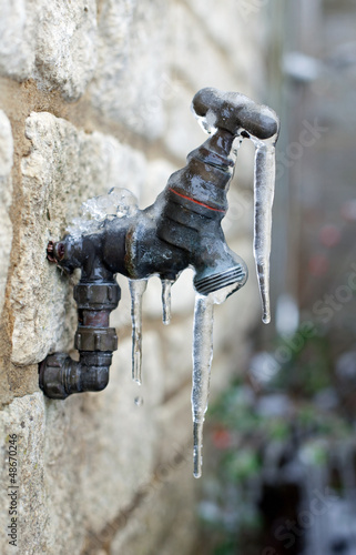 Old frozen water tap