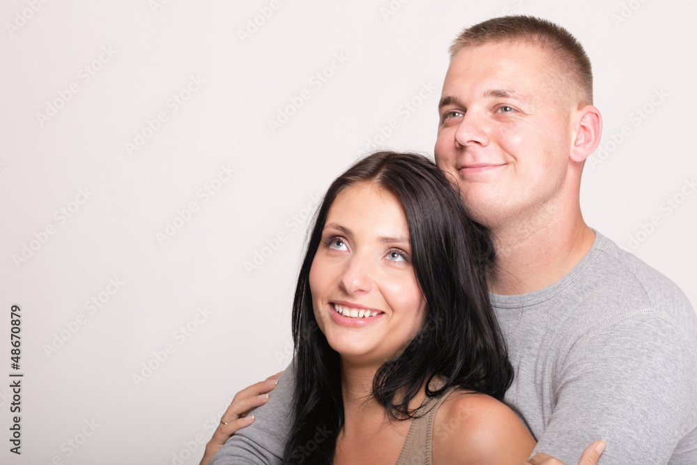 young in love happy smiling couple isolated young in love happy smiling couple isolated