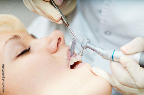 dentist healthcare teeth polishing work photo
