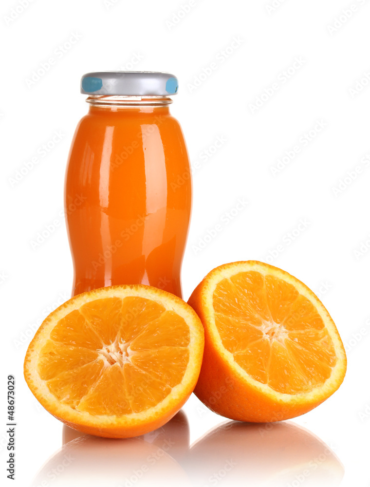 Delicious orange juice in a bottle and orange next to it Delicious orange juice in a bottle and orange next to it