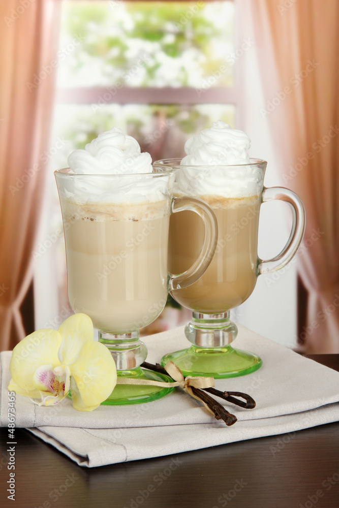 Fragrant coffee latte in glasses cups with vanilla pods, Fragrant coffee latte in glasses cups with vanilla pods,