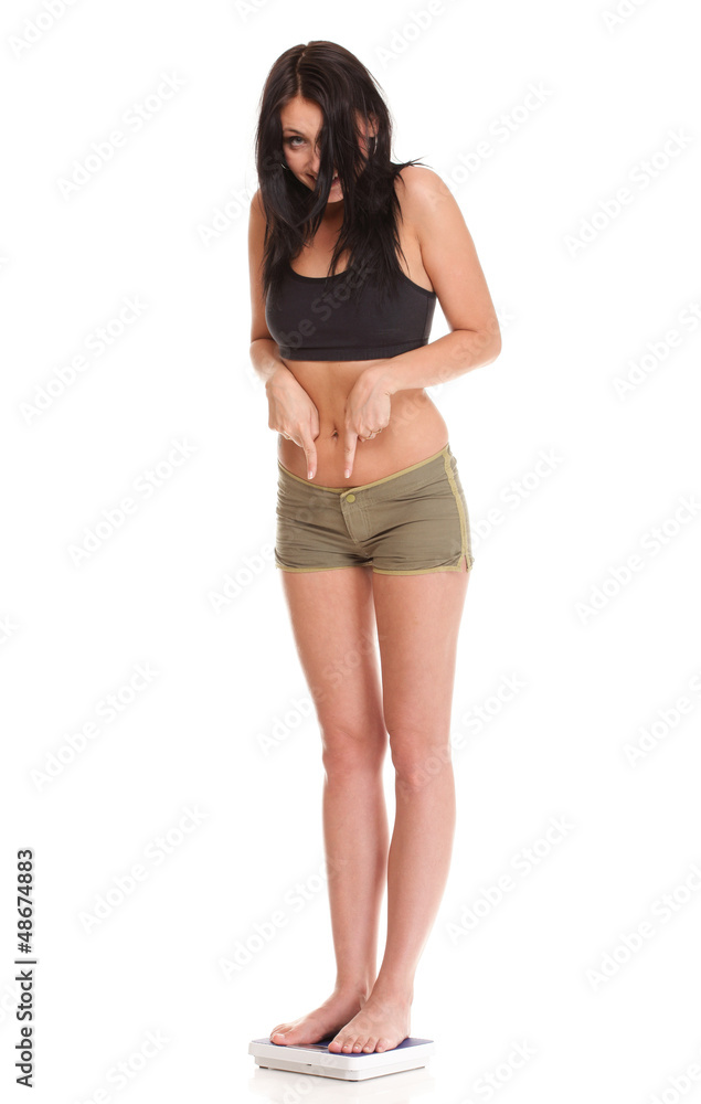 Weight loss woman on scale happy Weight loss woman on scale happy