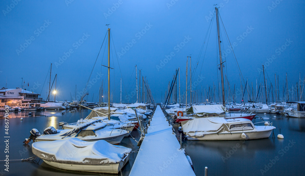 Snow Covered Boats in a Marina
