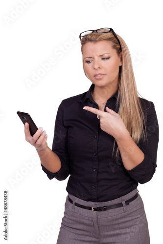 Angry business woman with a smartphone