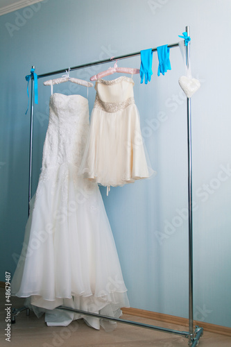 wedding dress and accessories on hanger