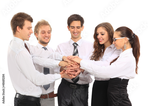 business team putting their hands on top