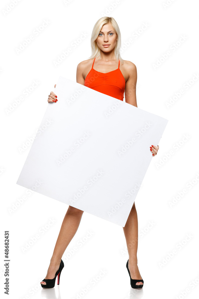 Calm woman in full length holding empty banner Calm woman in full length holding empty banner