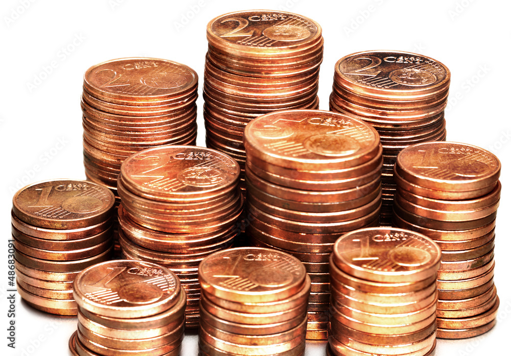 A stack of Euro Cent coins on a white background A stack of Euro Cent coins on a white background