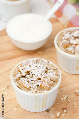 apple cake with nuts in a white ramekin top view