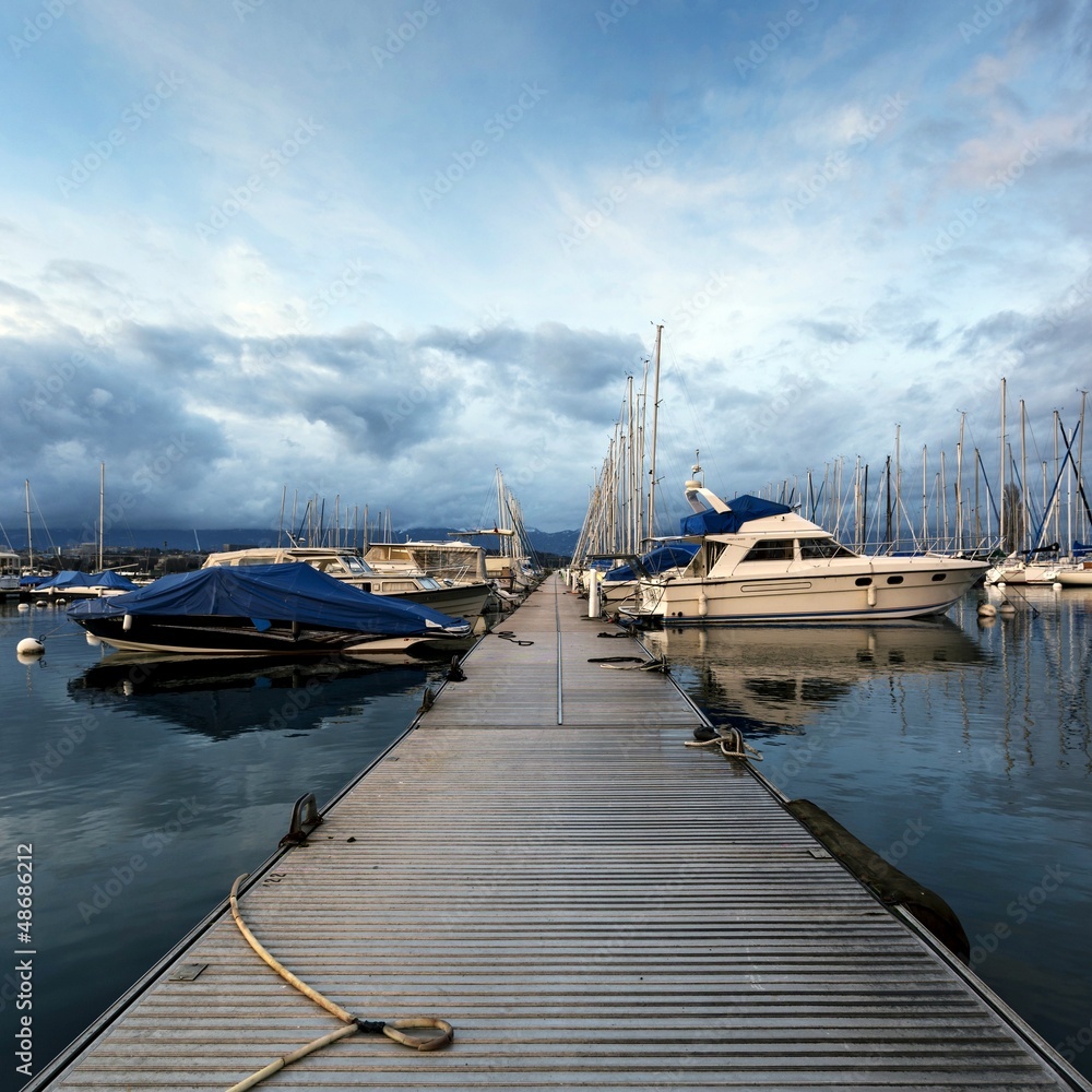 Fototapeta premium Boats docking at Lake Geneva