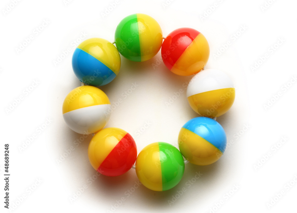 Colourful rattle on white background Colourful rattle on white background