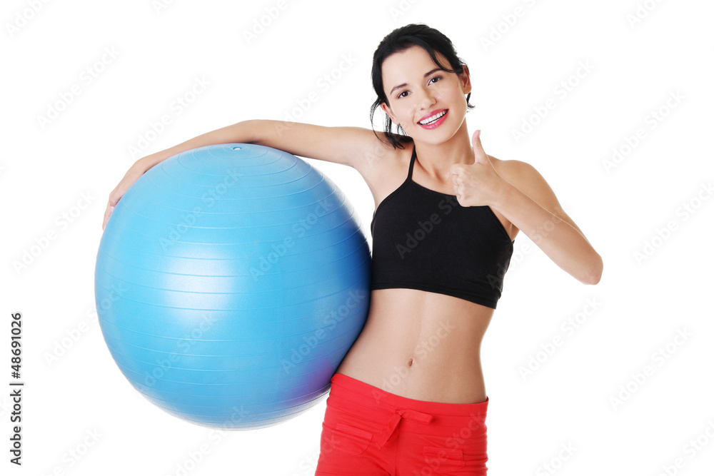 Beautiful young woman with pilates exercise ball. Beautiful young woman with pilates exercise ball.