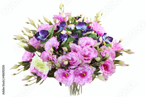 bouquet of artificial lisianthus and viola on a white background © ksi