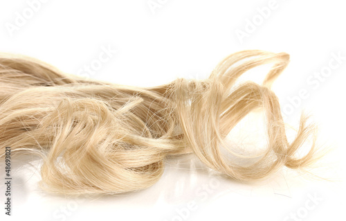 Curly blond hair close-up isolated on white