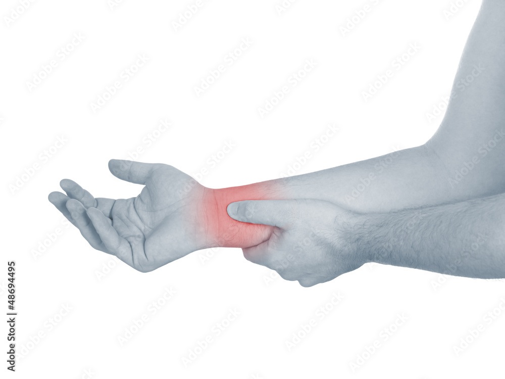 Acute pain in a man wrist. Male holding hand to spot of wrist pa Acute pain in a man wrist. Male holding hand to spot of wrist pa