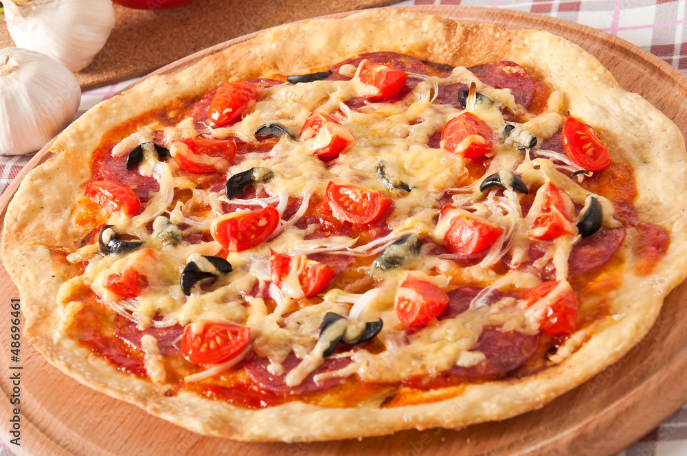pizza with salami and tomatoes pizza with salami and tomatoes