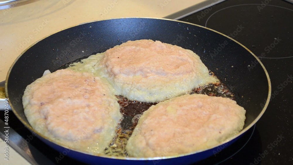 hand open pan cover and turn over baking potatoes pancakes hand open pan cover and turn over baking potatoes pancakes