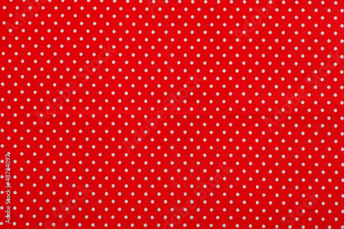red polka dot fabric pattern