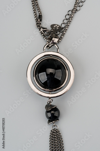 Silver pendant with large black gem photo