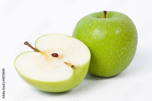 Green apples and half of apple Isolated on a white background