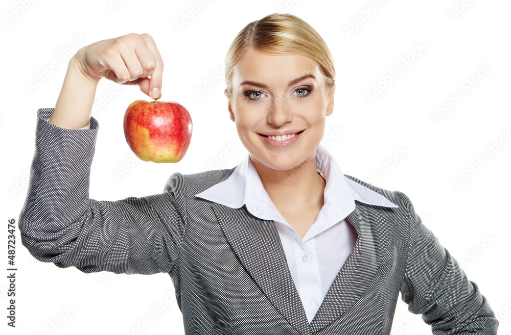 Businesswoman with red apple in her hand - healthy eating concep Businesswoman with red apple in her hand - healthy eating concep