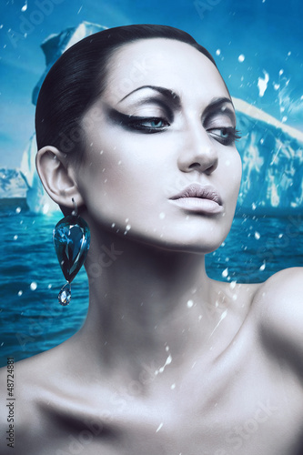 portrait of brunette winter woman with diamond earring