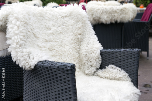 Comfortable fell chair with white foor outdoors