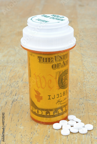 pill bottle with money