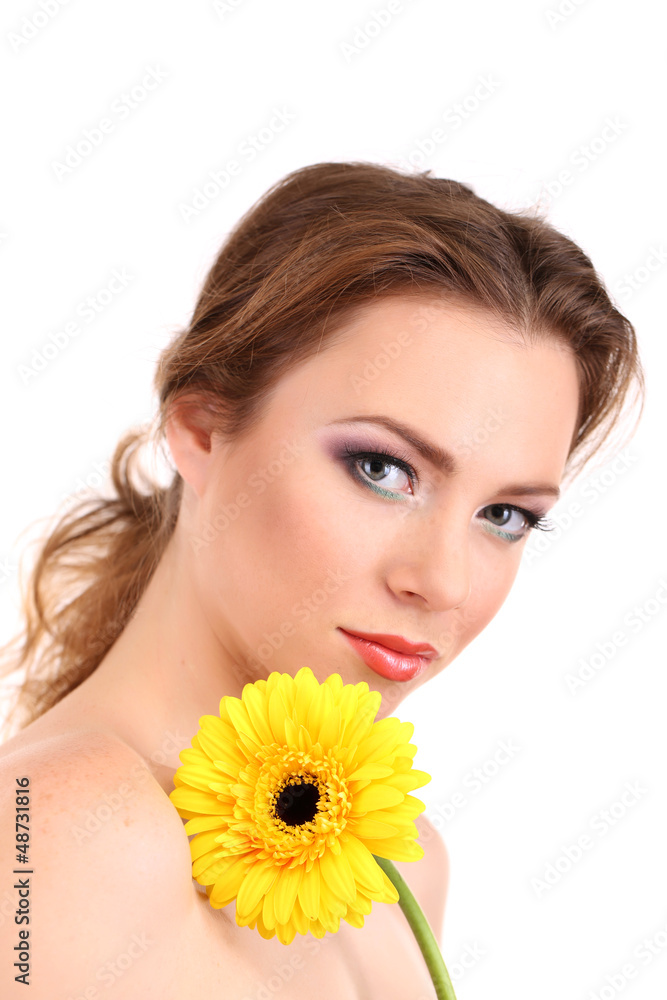 Beautiful young woman with bright make-up, holding flower,