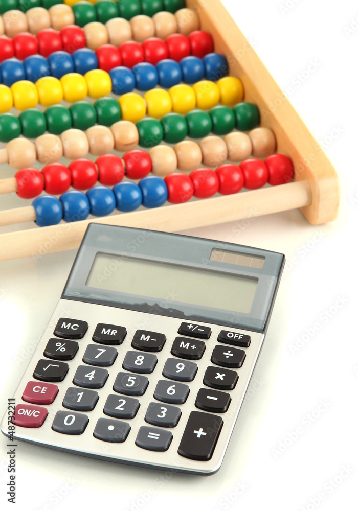 Bright wooden toy abacus and calculator, isolated on white Bright wooden toy abacus and calculator, isolated on white