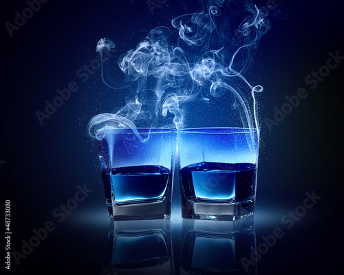 Two glasses of blue cocktail