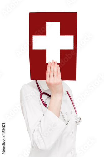 woman with a red cross on a list photo