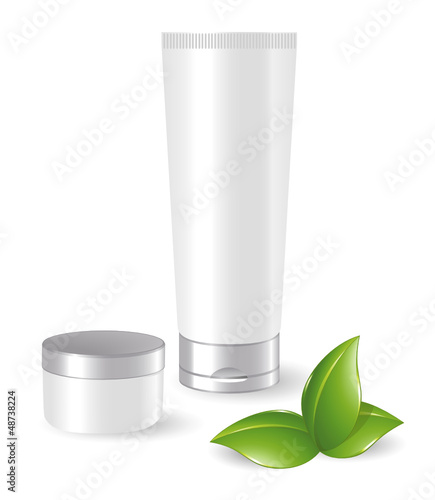 Blank cosmetic containers with green leafs