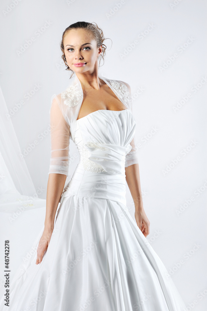 Young beautiful woman wearing luxurious wedding dress Young beautiful woman wearing luxurious wedding dress