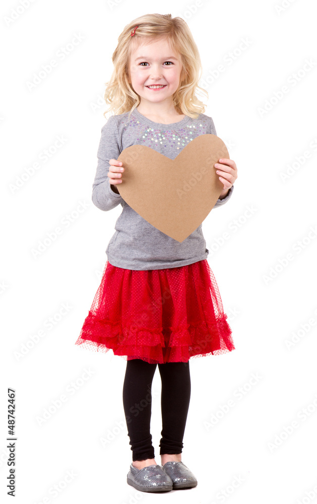 Little girl holding heart Little girl holding heart