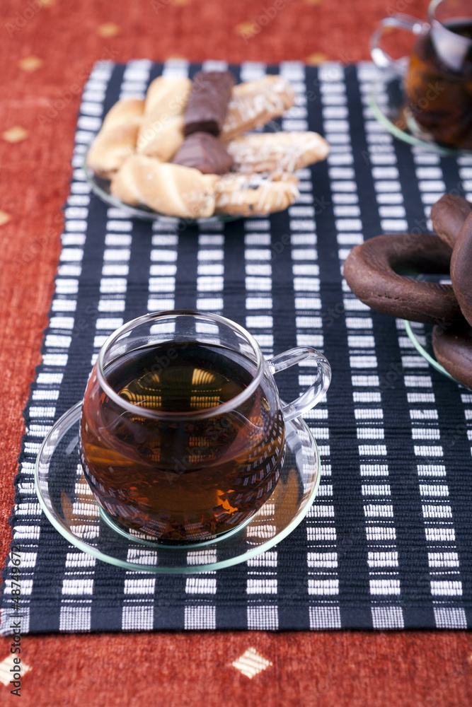Cup of tea with a plate of cookies Cup of tea with a plate of cookies
