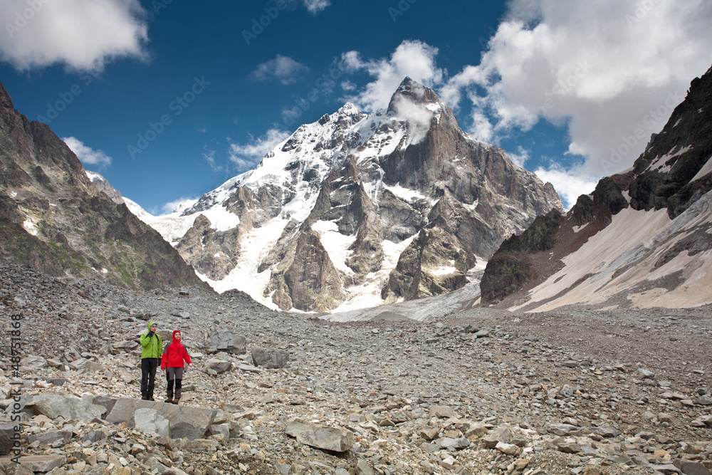 Trekker in high mountains of Georgia Caucasus