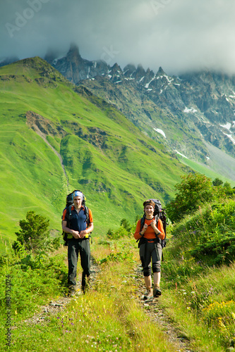 Trekker in high mountains of Georgia Caucasus © Maygutyak
