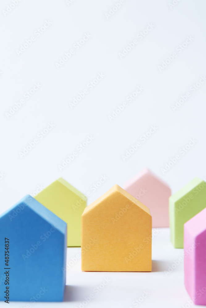 Multi Colored House Shaped Blocks On White Background Multi Colored House Shaped Blocks On White Background