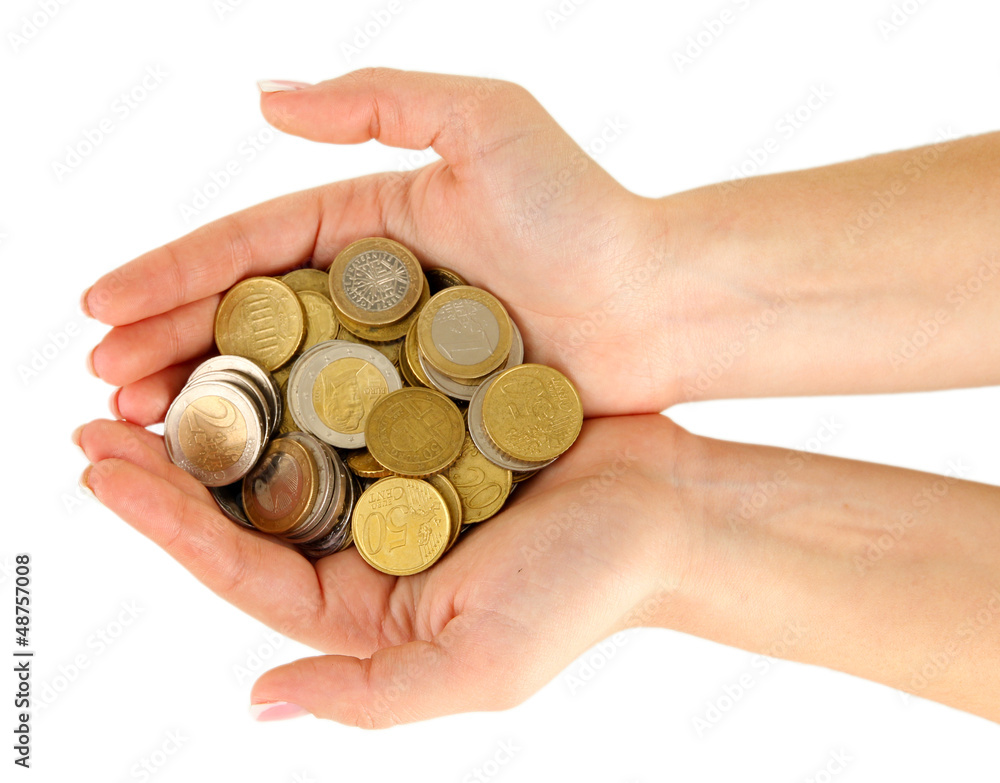 Woman hands with coins isolated on white. Woman hands with coins isolated on white.