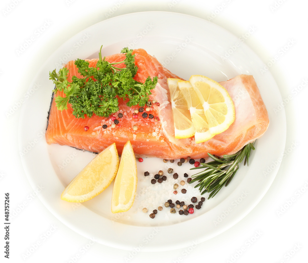 Fresh salmon fillet with herbals and lemon slices Fresh salmon fillet with herbals and lemon slices