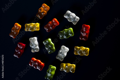 gummi bear - on black photo