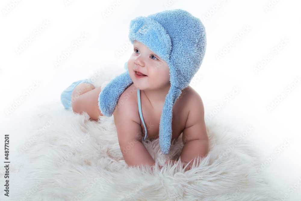 Happy smiling baby boy looking out and smiling Happy smiling baby boy looking out and smiling